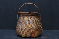 可愛らしいシルエットをした持ち手付き花カゴ DC7614