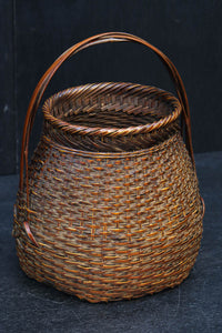 可愛らしいシルエットをした持ち手付き花カゴ DC7614