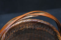 可愛らしいシルエットをした持ち手付き花カゴ DC7614