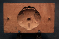 A cake type DB5884a-h stock with a lid aligned with a pattern of a good luck flora and fauna (a:1 b:0) c:0 d:1 e:0 f:1 g:1 h:1)