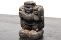 細目に口を開けた表情が魅力の木彫りの大黒様 DC1474