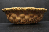 丁寧に編み込まれた優しい風合いの竹製平丸カゴ DC2460