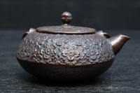 桜模様が浮かぶ小さな鉄瓶　DC8184