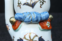 ちょこんと座る姿が可愛らしい招き猫　DC8388