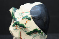 ふくよかなお顔立ちの縁起の良いお多福の置物(木箱付き)　DC8602