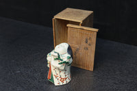 ふくよかなお顔立ちの縁起の良いお多福の置物(木箱付き)　DC8602
