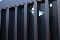 幅685ミリ　落ち着いた面持ちある半スリガラス入り全面角太格子戸　F8639　在庫4枚