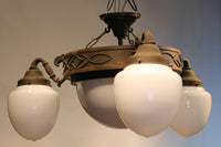 Four-lamp chandelier DB2105 of elegant decorative metal fittings with a gentle taste