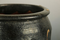 a small pot with a glaze and a delicious taste of a bottle of DB4150