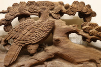 A wooden tabletop and pine deep carving engraving