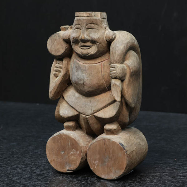 細目の笑顔で個性的な大黒様の木彫りの置物 DC1991 – 古福庵