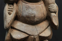 細目の笑顔で個性的な大黒様の木彫りの置物　DC1991